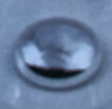 Shiny metallic droplet. 