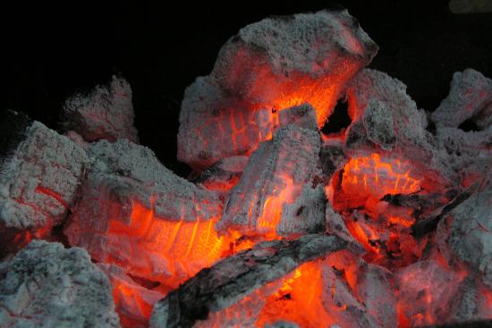Glowing red coal. 