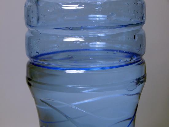 Image of a plastic bottle containing water.