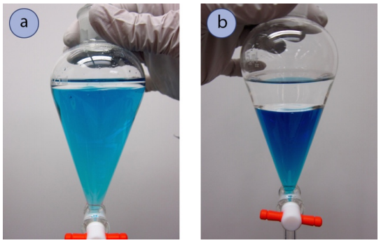  Sequence labelled A and B. A: container with blue liquid and thin layer of clear liquid above it. B: container with dark blue liquid and wider layer of clear liquid above it.
