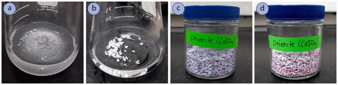   A: flask with clear liquid and diffuse white powder along the bottom. B: clear liquid with white clumps at bottom. C: Jar labelled "Drierite (C a S O 4 )" with grey pebbles inside. D: Same jar of drierite with grey pebbles now tinted slightly pink.