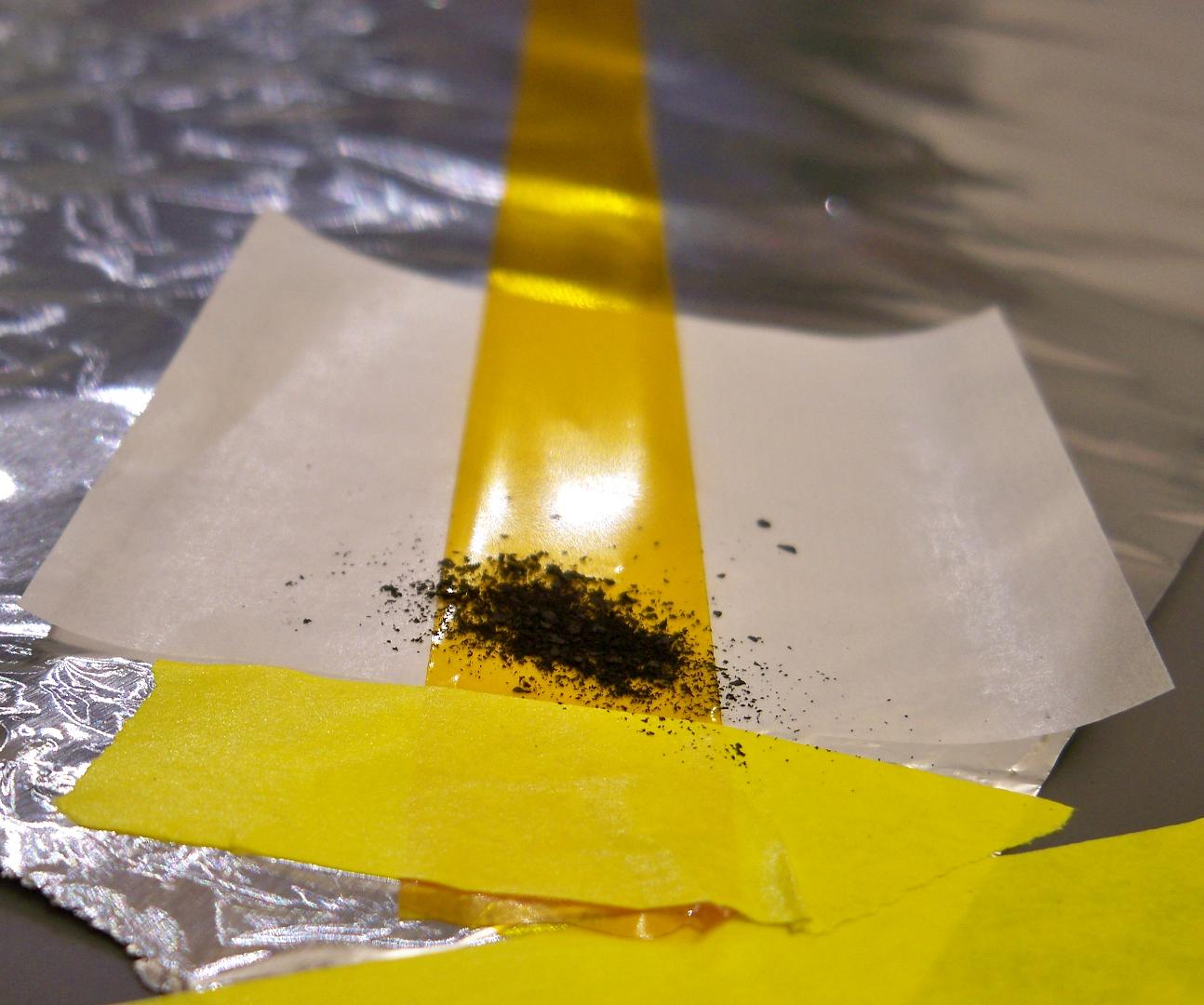 Add the sample onto an extreme of the Kapton tape