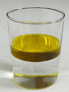 Water and oil separated in one cup.