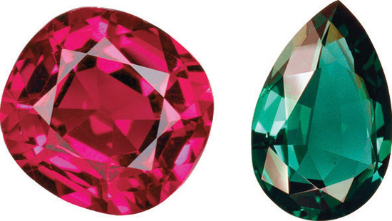 A piece of ruby and emerald is shown with a glassy crystalline exterior. Ruby is deep red in color and emerald is deep green. 