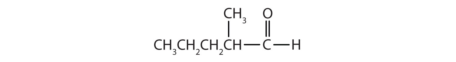 Un carbono carbonilo está unido a 1 átomo de H y a un grupo 1 metilbutilo.