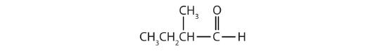 A carbonyl carbon is bonded to 1 H atom and a 1 methylpropyl group.
