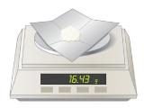 Image of a balance with weigh paper and a white powder on it measuring 16.43 grams.