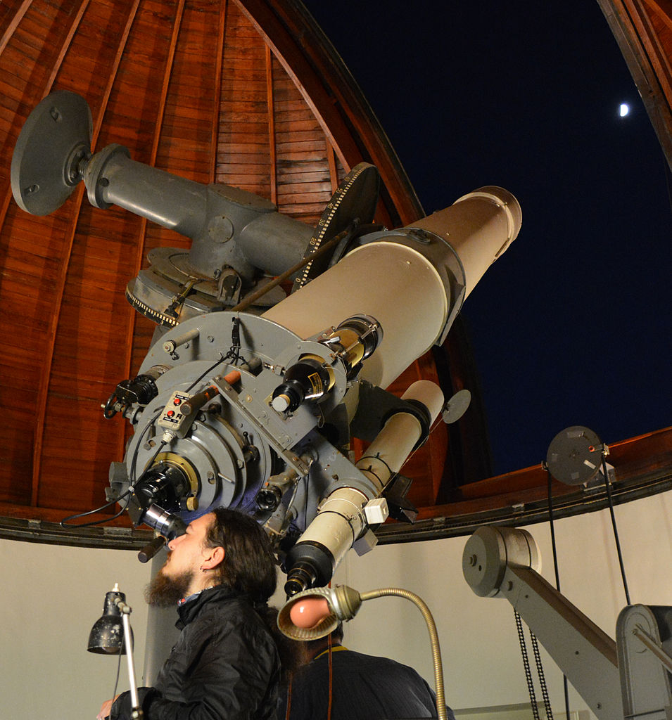 Image of a telescope inside an observatory.