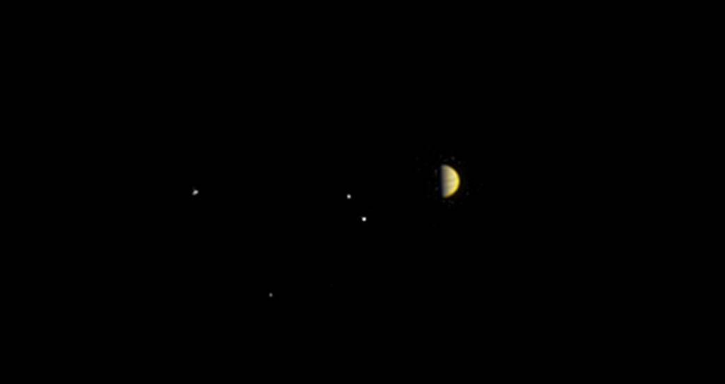 NASA's Juno spacecraft obtained this color view on June 21, 2016, at a distance of 6.8 million miles (10.9 million kilometers) from Jupiter. Juno will arrive at Jupiter on July 4. As Juno makes its initial approach, the giant planet's four largest moons -- Io, Europa, Ganymede and Callisto -- are visible.