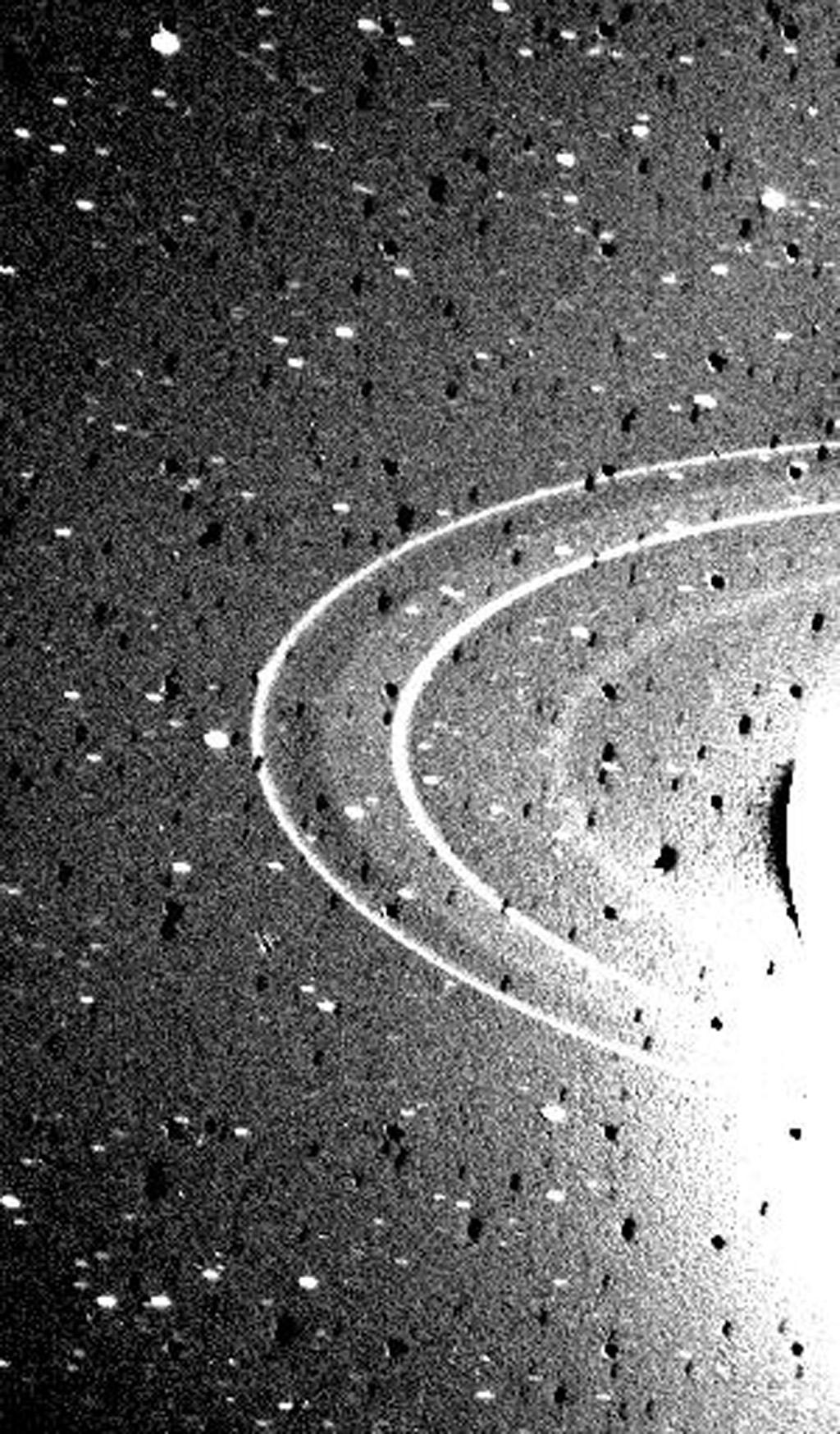 Image of Black and white image showing Neptune’s rings.