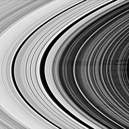 Image of Spokes in Saturn’s B Ring; dark horizontal lines seen running from right to the middle of the image.