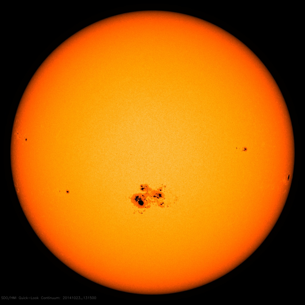 Photosphere, visible portion of the sun, with sunspots.