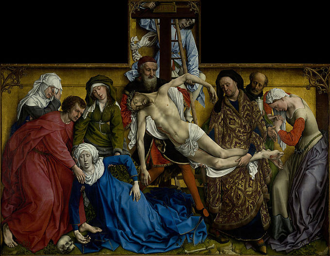The crucified Christ is lowered from the cross, his lifeless body held by Joseph of Arimathea and Nicodemus. Other figures also surround the body.