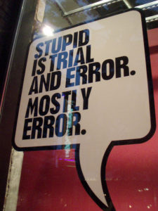 Sign in window reading "Stupid is trial and error. Mostly error."