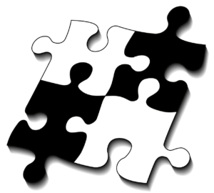 Four puzzle pieces fitting together.