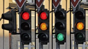 photograph of four traffic lights.