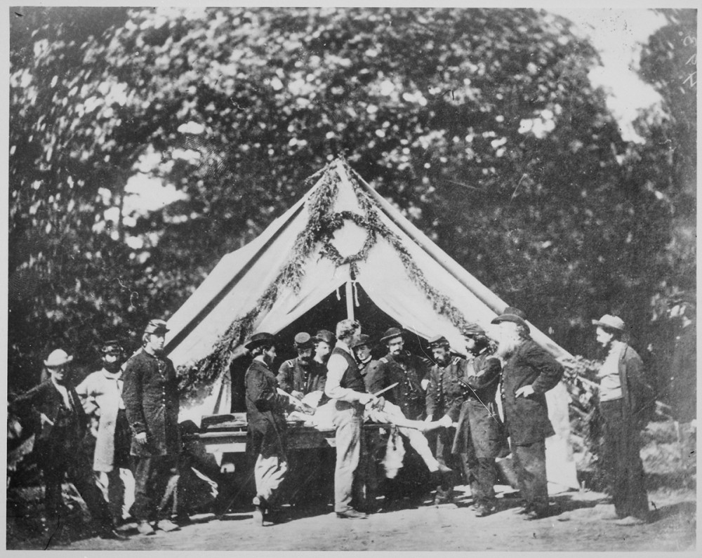 Men at a hospital tent.
