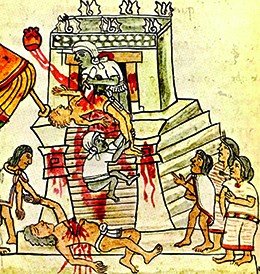 An illustration shows an Aztec priest cutting the beating heart out of a sacrificial victim on the top of the steps of a temple. The heart rises from the victim’s chest toward the sun. A previous victim is shown lying at the foot of the temple, surrounded by several onlookers.