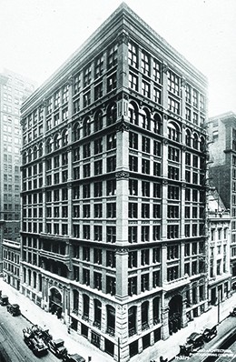 A photograph shows the Home Insurance Building in Chicago.