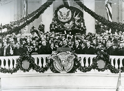 A photograph shows Franklin Roosevelt speaking at his inauguration at the U.S. Capitol, surrounded by supporters.