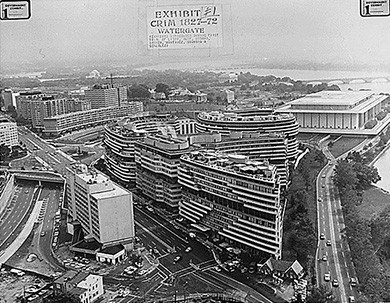 A photograph shows an aerial view of the Watergate hotel and office complex.