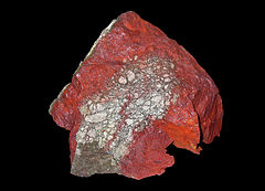 A chunk of reddish cinnabar ore.