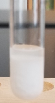 carbonato de calcio y carbonato de bario precipitados usando reactivo de carbonato de amonio.