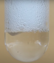 Hydrochloric acid and magnesium are combined in a test tube.