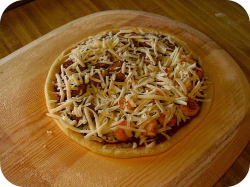 An uncooked pizza