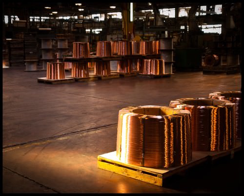 Coil of copper wire, which conducts electricity well due to metallic bonds