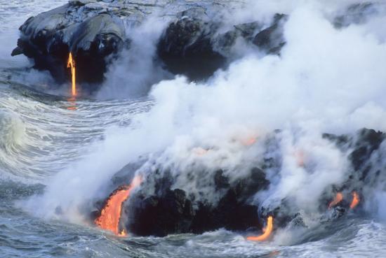 Image of hot lava flowing into the ocean solidifying into obsidian.