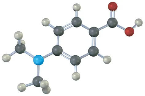 A ball-and-stick model of a benzene ring with a carboxyl group and a dimethylamine group para to the carboxyl.