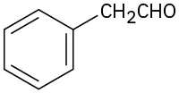 The structure of phenylacetaldehyde. A benzene ring with the first carbon attached to C H 2 C H O group.