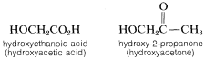 Izquierda: H O C H 2 C O 2 H. Ácido hidroxietanoico marcado (ácido hidroxiacético). Derecha: H O C H 2 C. Carbono más a la derecha unido simple a C H 3 y doble enlazado a O. Marcada hidroxi-2-propanona (hidroxiacetona).