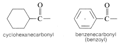 Izquierda: ciclohexano simple unido a un carbono con un O de doble enlace y un enlace sencillo extra. Ciclohexanocarbonilo marcado. Derecha: anillo de benceno unido simple a un carbono con un O de doble enlace y un enlace simple extra. Bencenocarbonilo marcado (benzoilo).