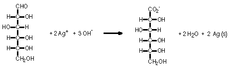 Equation showing aldehyde group of a hydrocarbon reacting with 2 moles of "A" "G" 2 positive ions and 3 moles of "O" "H" negative ions to give 2 moles of silver in its solid state, 2 moles of water, and 1 mole of the hydrocarbon with aldehyde group replaced with carboxylate ion. 