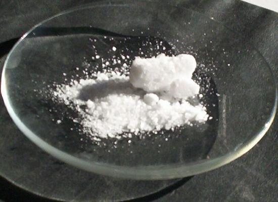 White powder on a petri dish. 