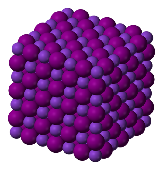 Two spheres with different shades of purple are tightly packed in a rigid structure to form a cube. 