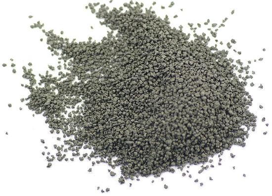 A pile of dark grey powder. 