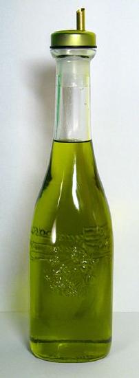 A glass bottle of olive oil.