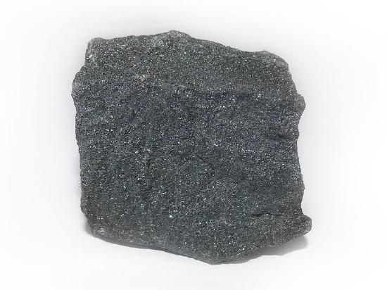 Chunk of grayish black material. 