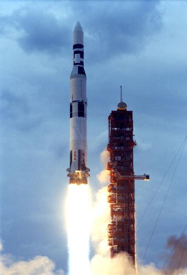 Spaceship launches from the Skylab Orbital Workshop into Earth orbit.