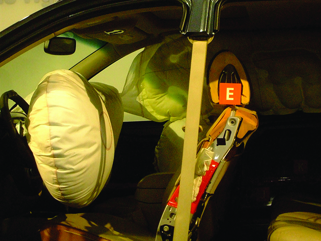 Deployed airbag in a testing car. 